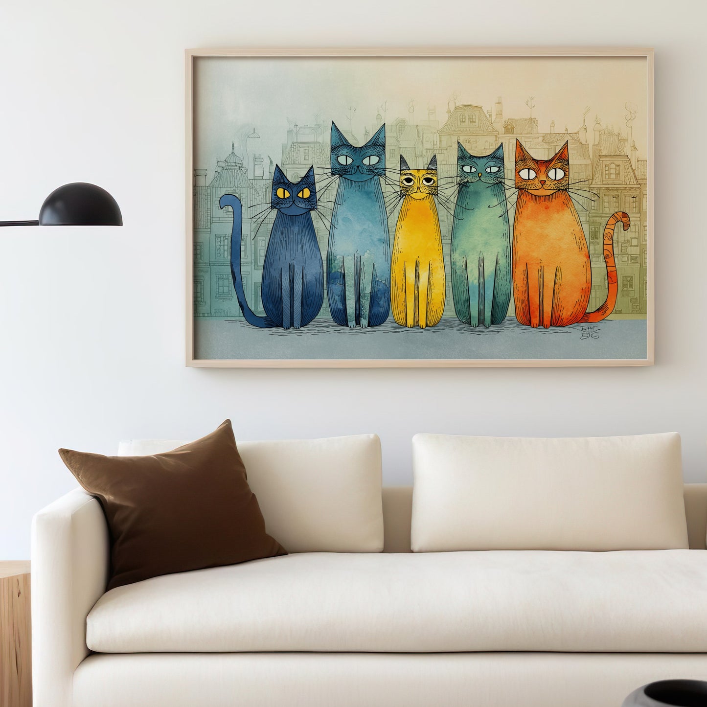 Five stylized cats in colorful cartoon style sit in front of a building mural.