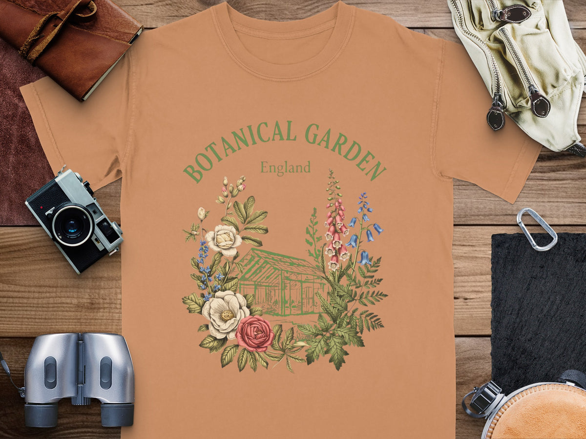 Orange t-shirt with "BOTANICAL GARDEN England" and floral greenhouse graphic.