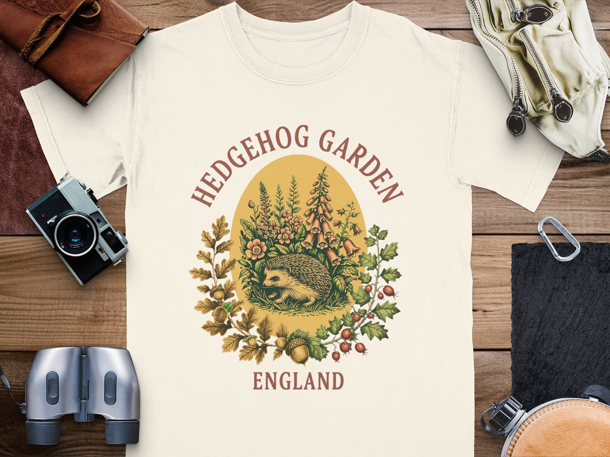 T-shirt with "HEDGEHOG GARDEN ENGLAND" text and a hedgehog surrounded by plants.