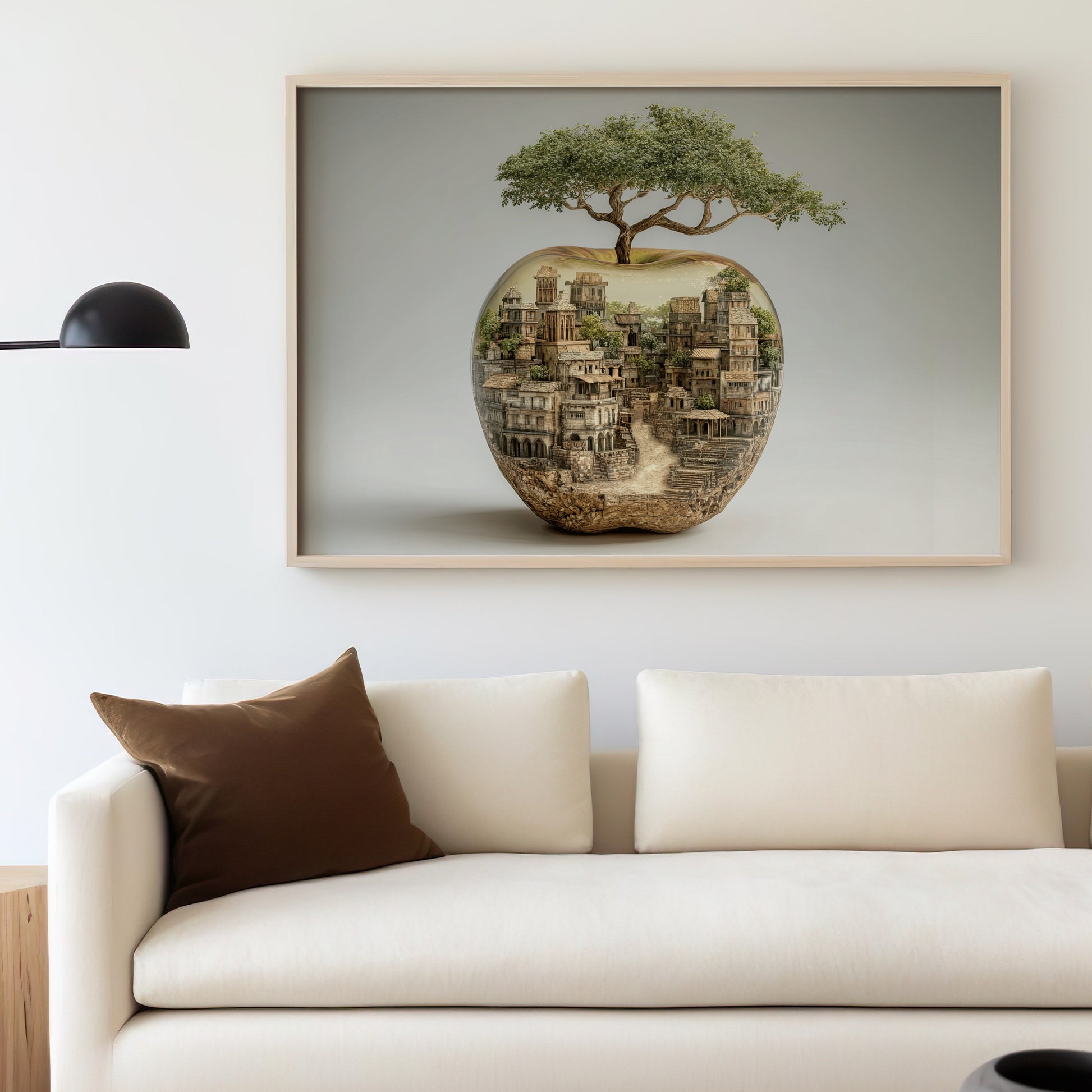 Surreal art depicts a miniature city within a cut apple with a tree growing from the top.