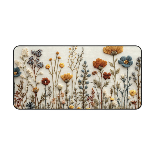 Embroidered patch with autumnal floral design on a white background