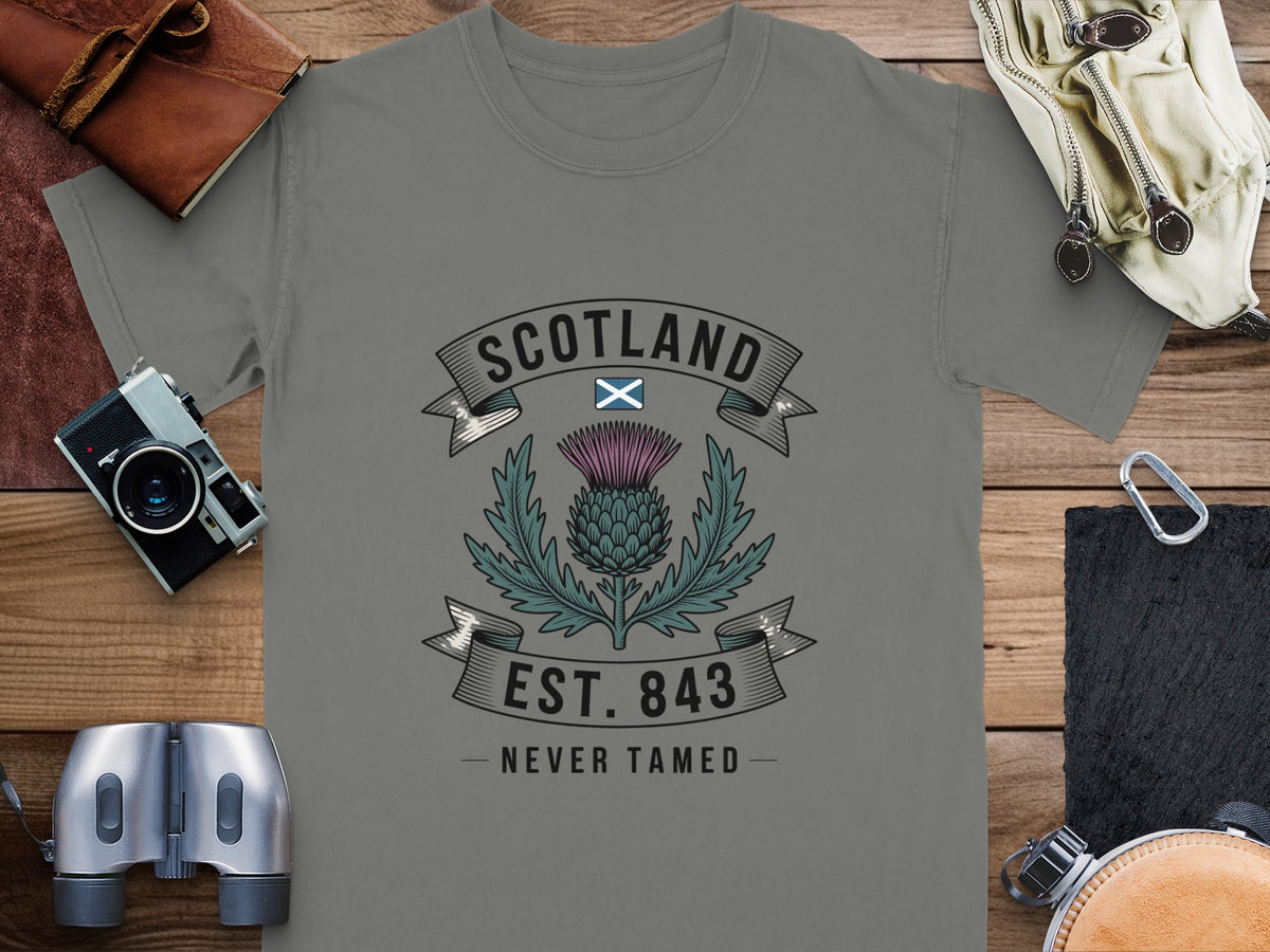 Grey t-shirt with Scotland Scottish thistle emblem and text "EST. 843 NEVER TAMED".