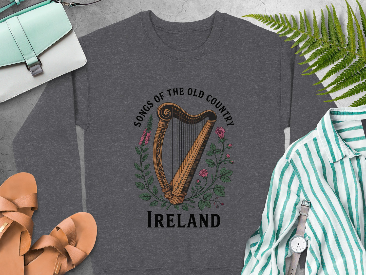 Harp illustration, flowers, and text "Songs of the Old Country Ireland" on Dark Heather sweatshirt