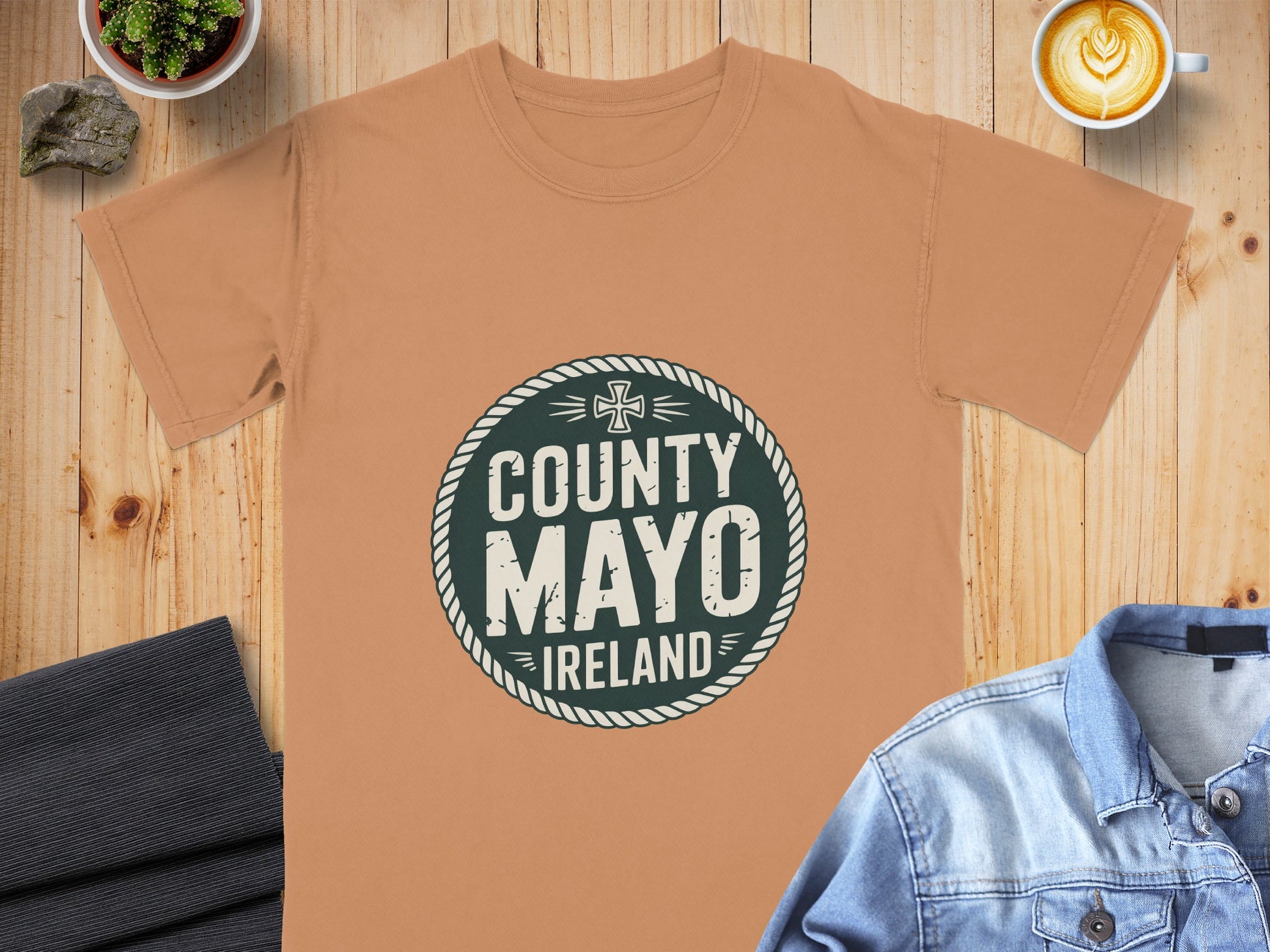 Orange t-shirt with "County Mayo Ireland" in a distressed circular emblem.