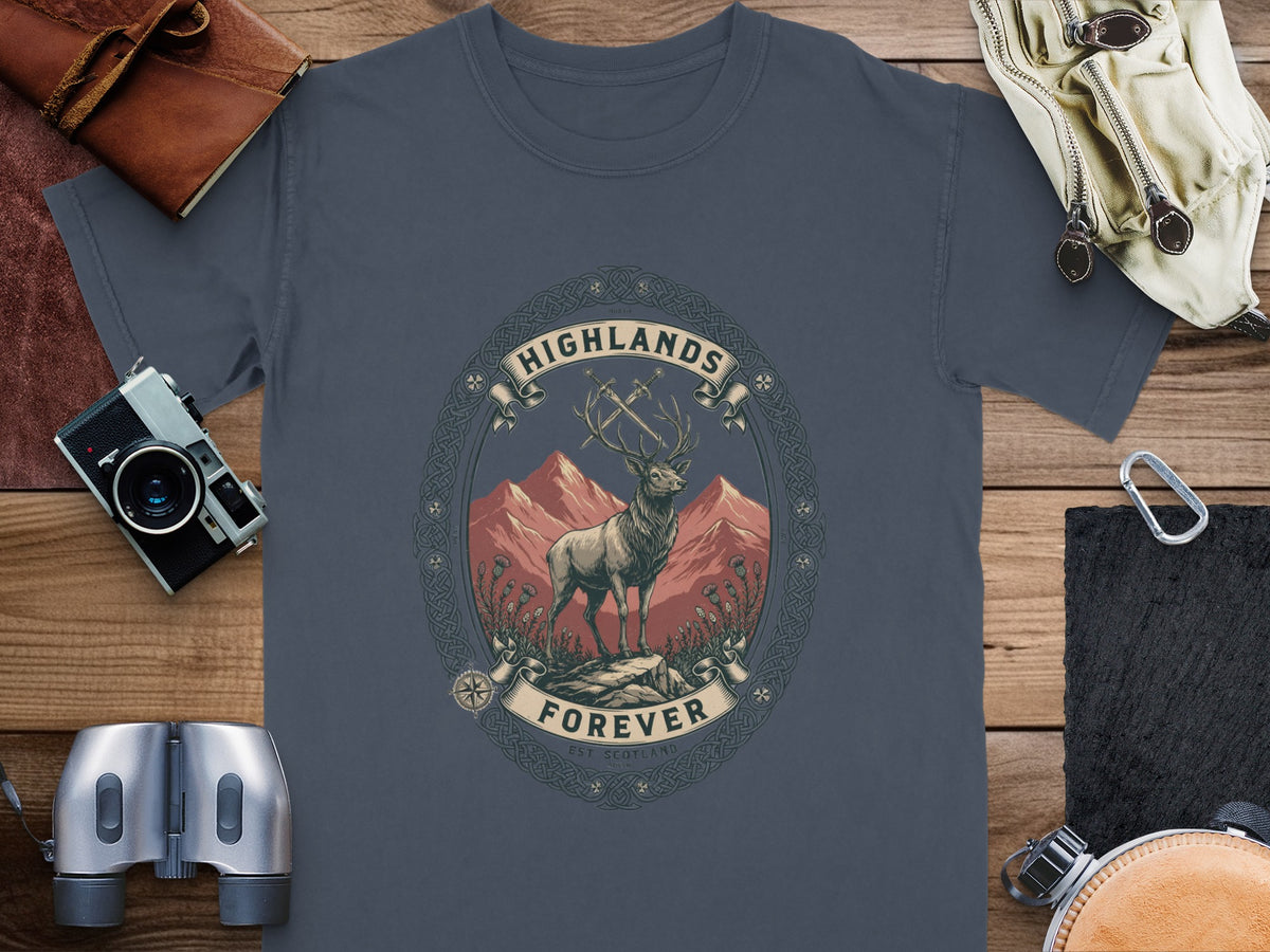 Deer and mountains graphic with "Highlands Forever Est Scotland" text on t-shirt.