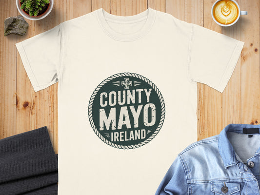 Cream t-shirt with dark green County Mayo Ireland circular distressed graphic.