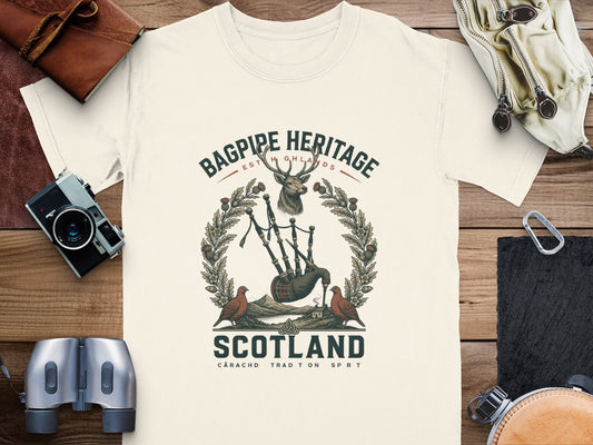 Bagpipe Heritage Scotland t-shirt graphic with deer, birds, and Scottish landscape.