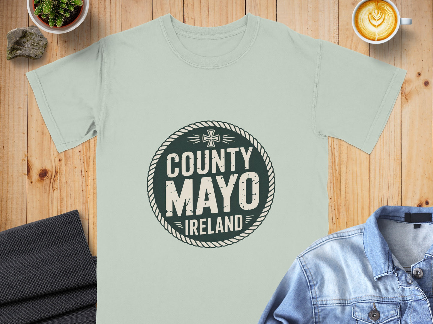 Light green t-shirt with "County Mayo Ireland" graphic in a dark circle.