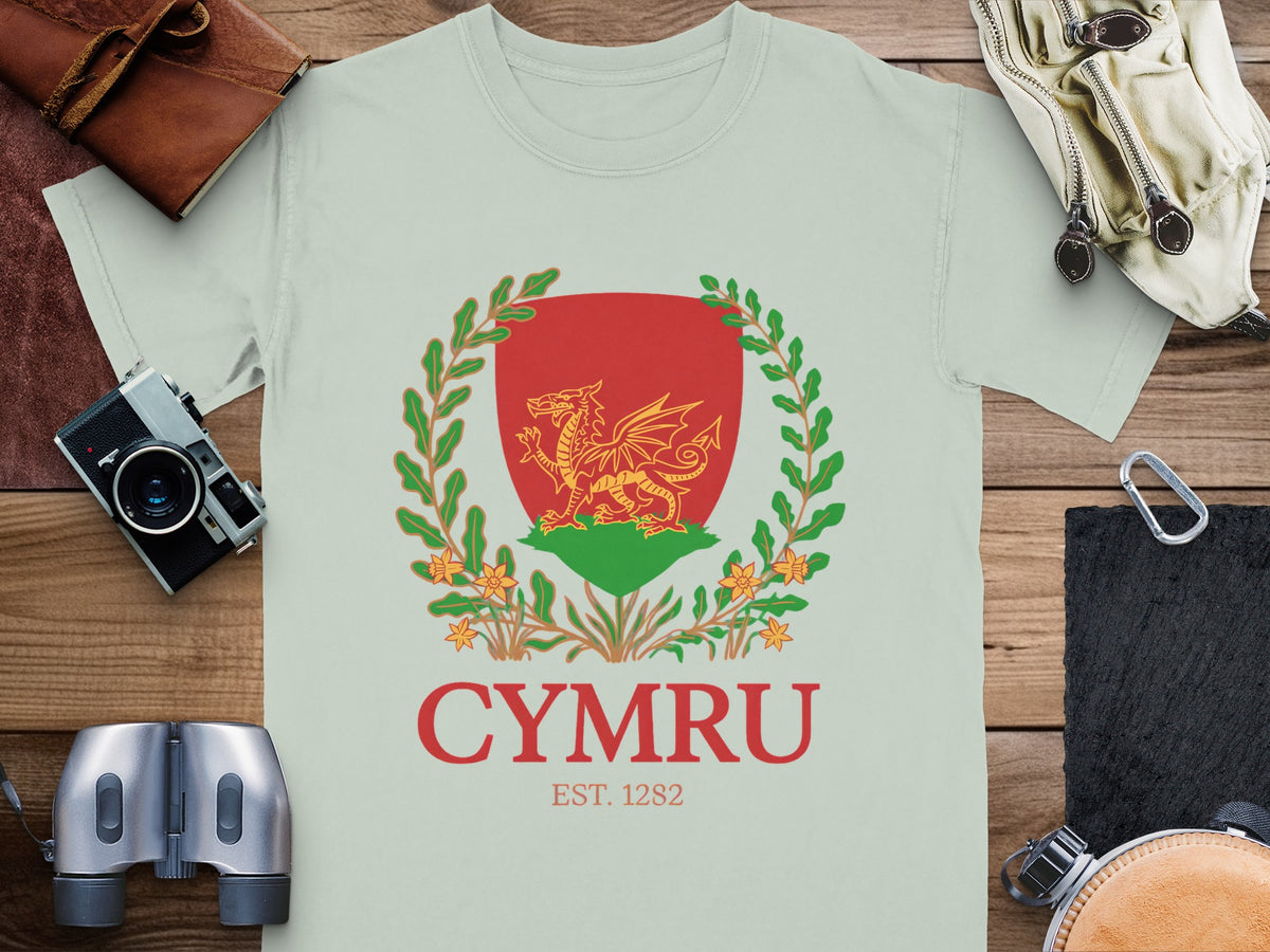 Light green t-shirt with Welsh dragon emblem and "CYMRU EST. 1282" text.