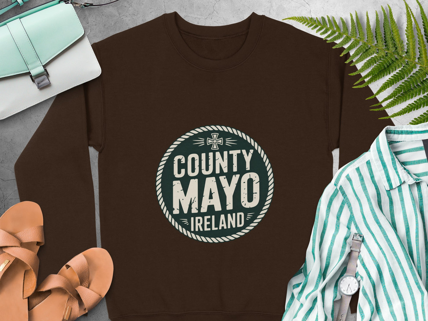 "County Mayo Ireland" graphic in a distressed circle logo on Dark Chocolate sweatshirt