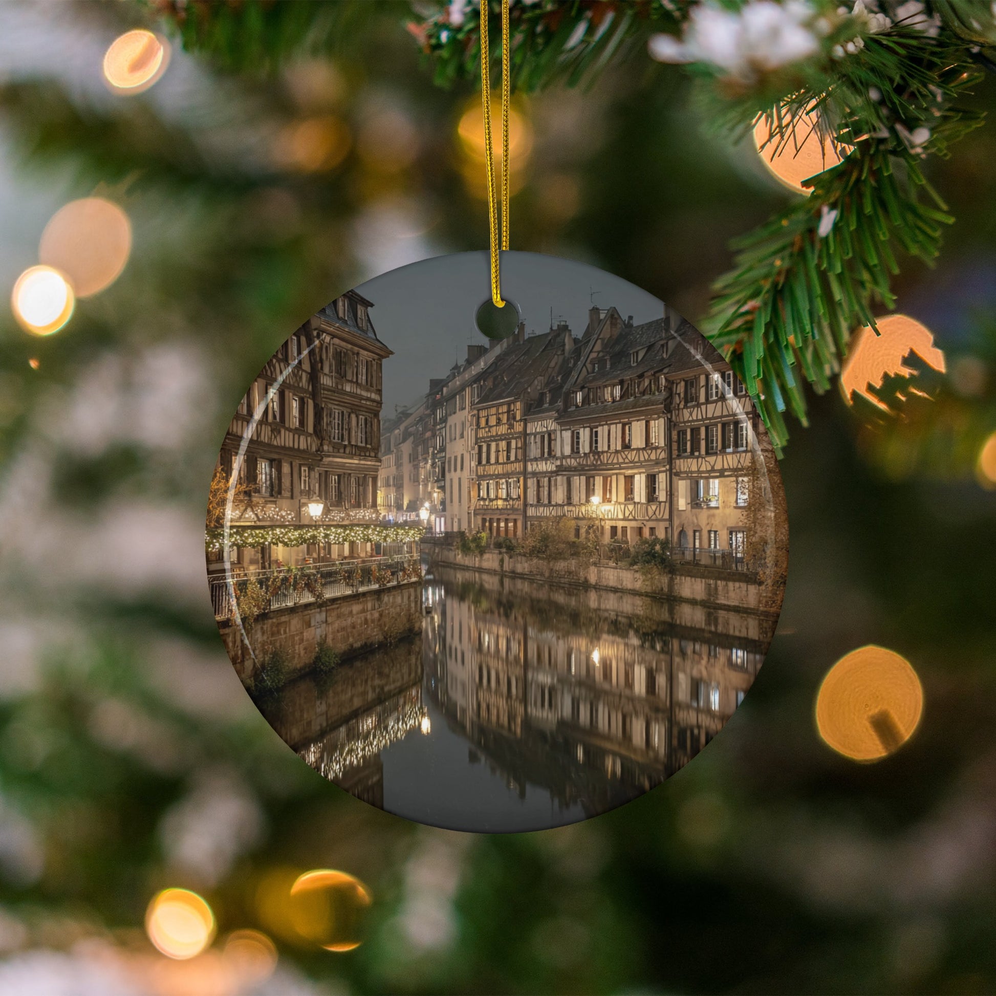 Illuminated Festive Town Scene on Christmas Ornament