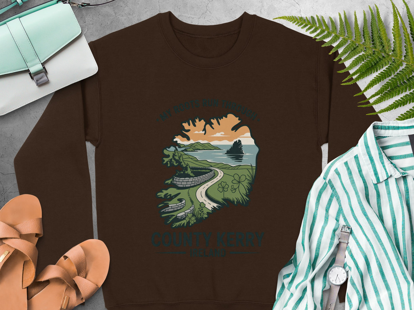 Brown sweatshirt with County Kerry Ireland landscape graphic and text.