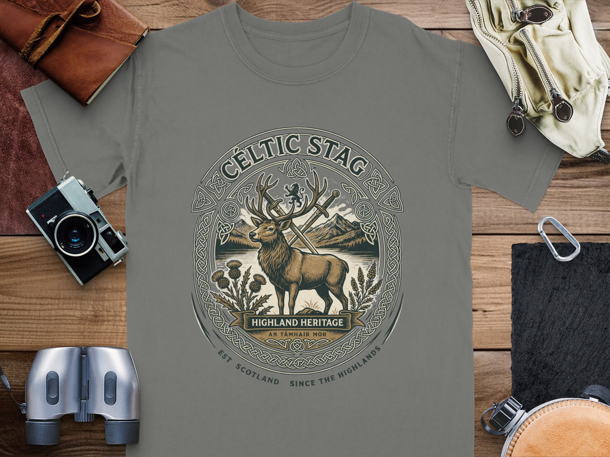 Celtic Stag design with a stag, swords, thistles, and mountains on a grey t-shirt.