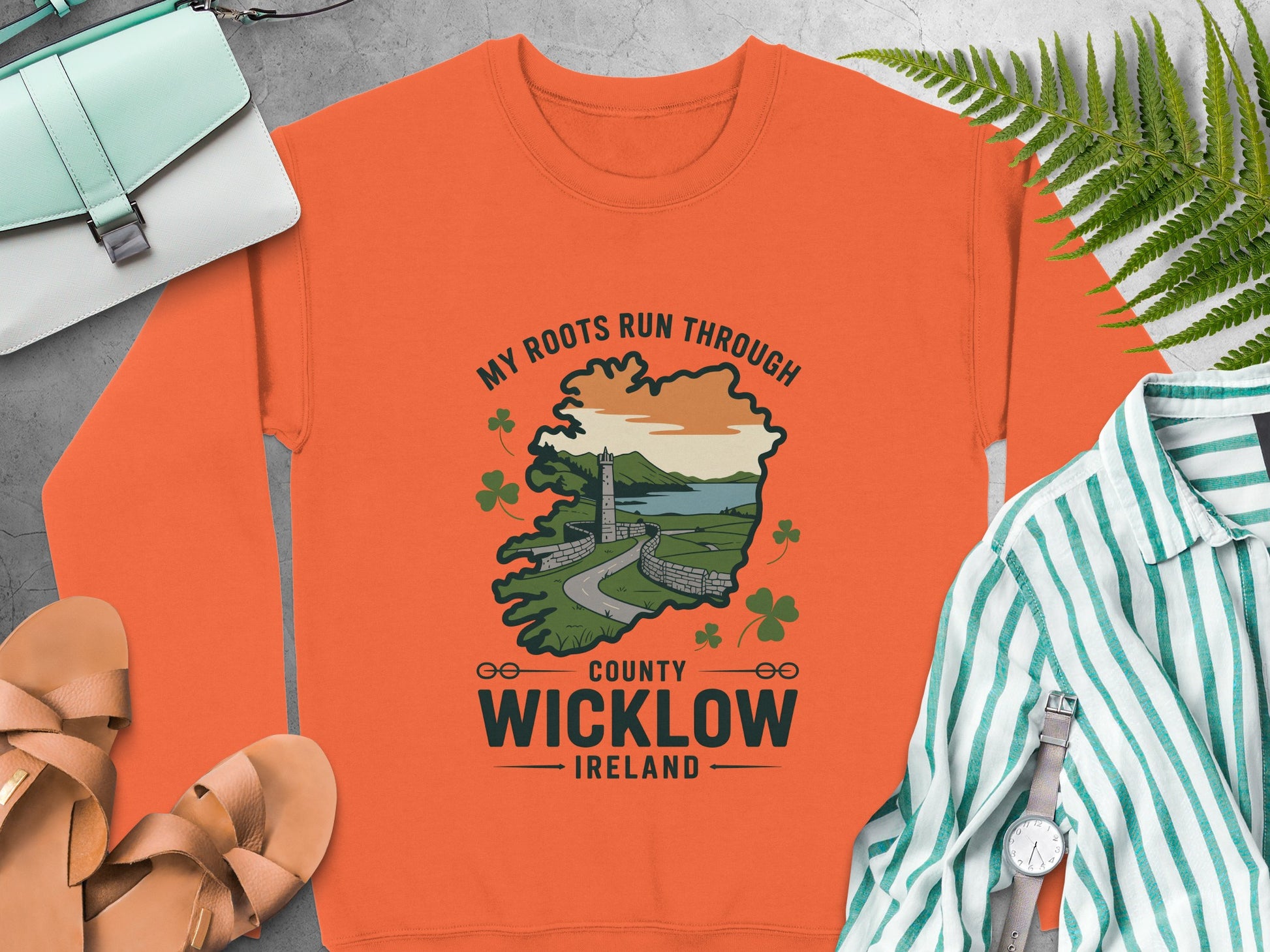 Orange sweatshirt with "My Roots Run Through County Wicklow Ireland" graphic.