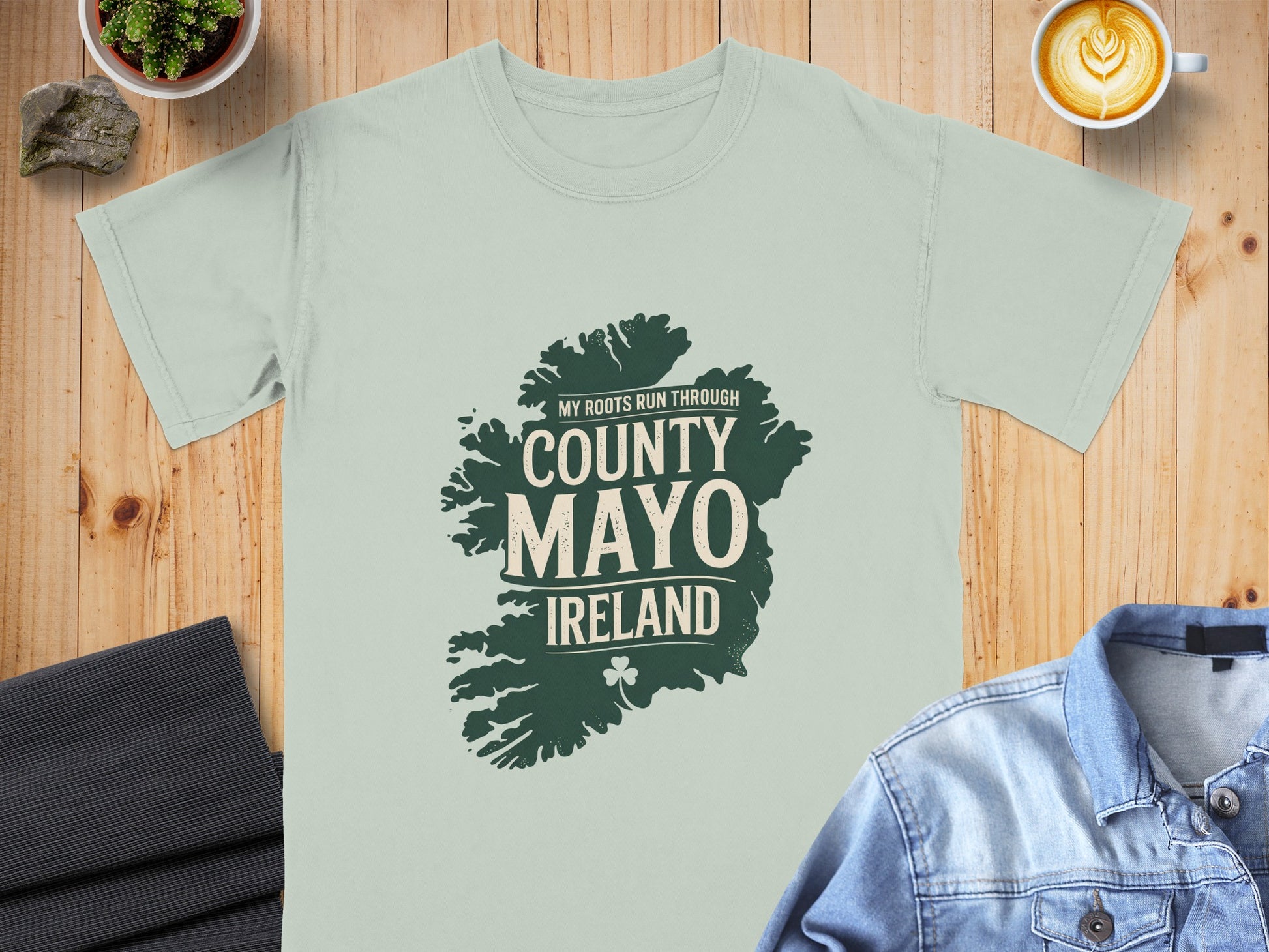 Light green t-shirt with "County Mayo Ireland" map graphic and shamrock.