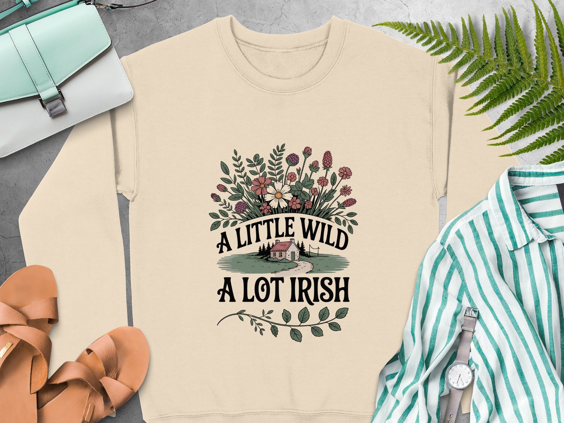 "A little wild A lot Irish" text and floral design on Sand sweatshirt