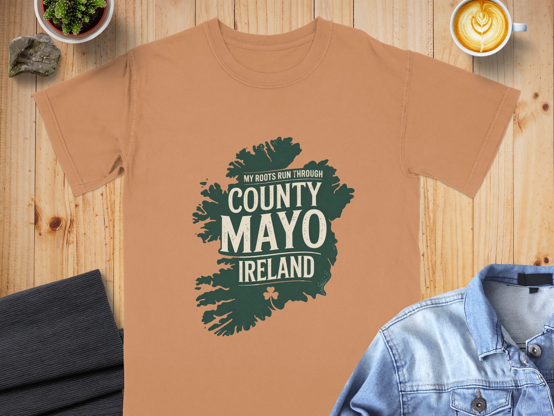 Orange t-shirt with "My Roots Run Through County Mayo Ireland" text on a map outline.