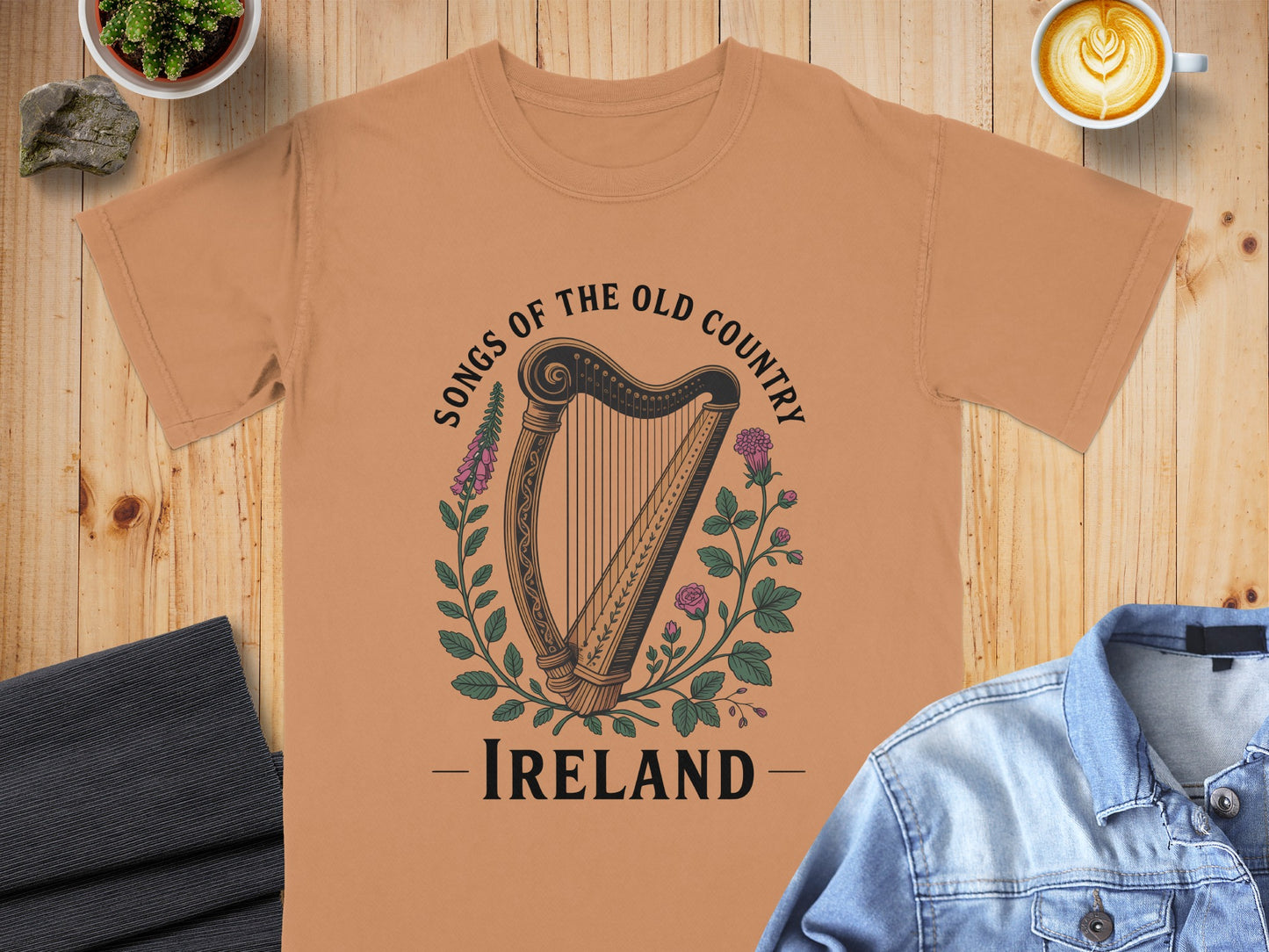 T-shirt with a harp, flowers, and text "Songs of the Old Country - Ireland".