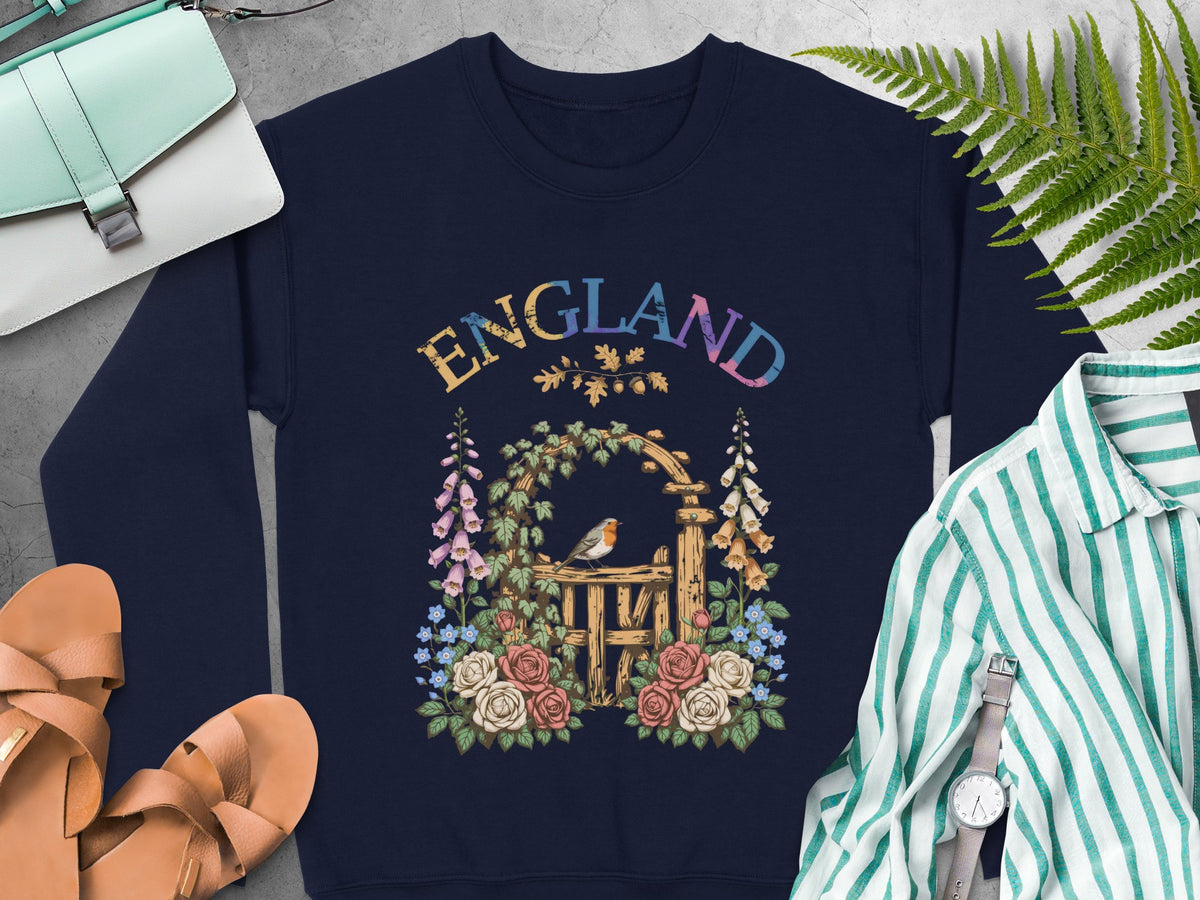 Navy sweatshirt with an "ENGLAND" floral archway and robin graphic.