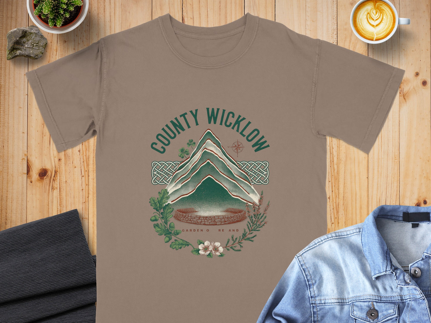 Brown t-shirt with "COUNTY WICKLOW" and a mountain landscape graphic.