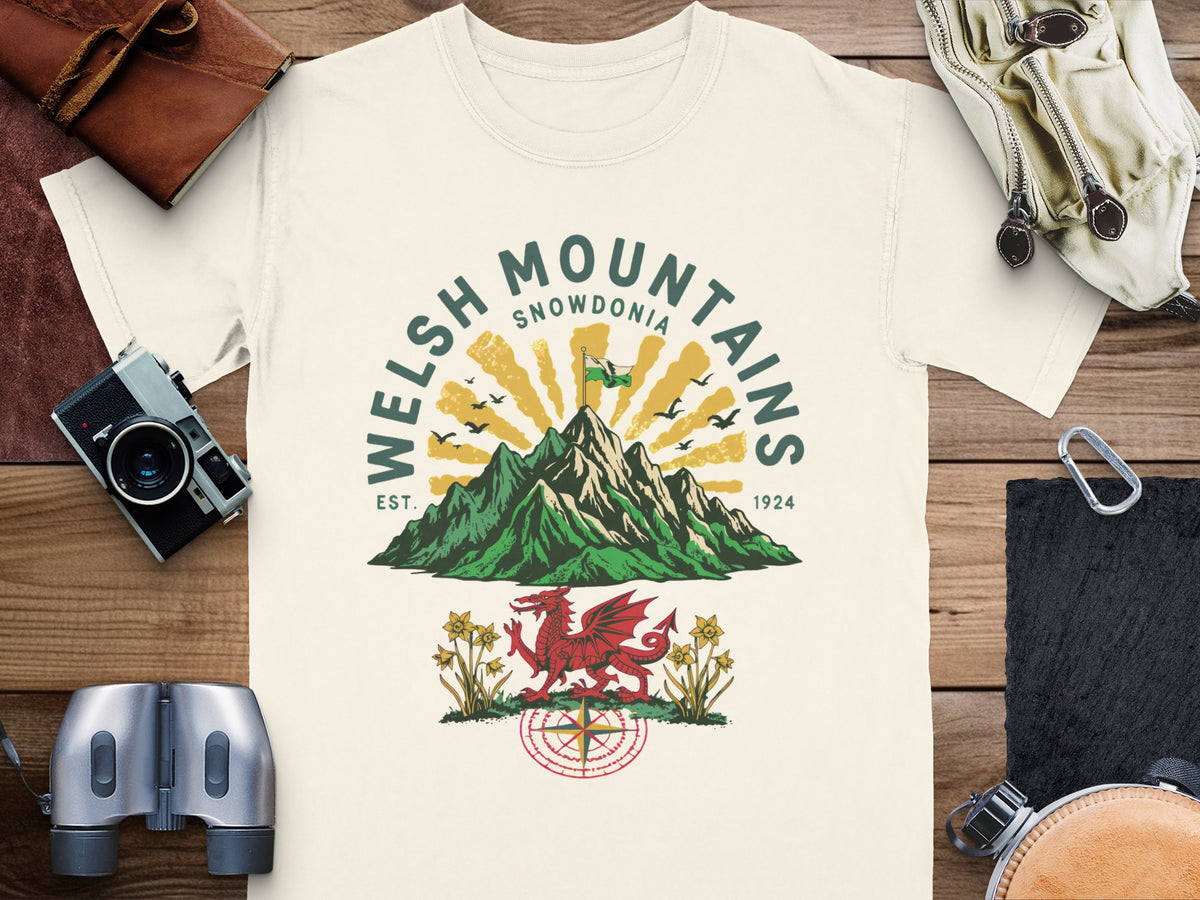 Cream t-shirt with Welsh Mountains Snowdonia graphic, dragon, and compass.