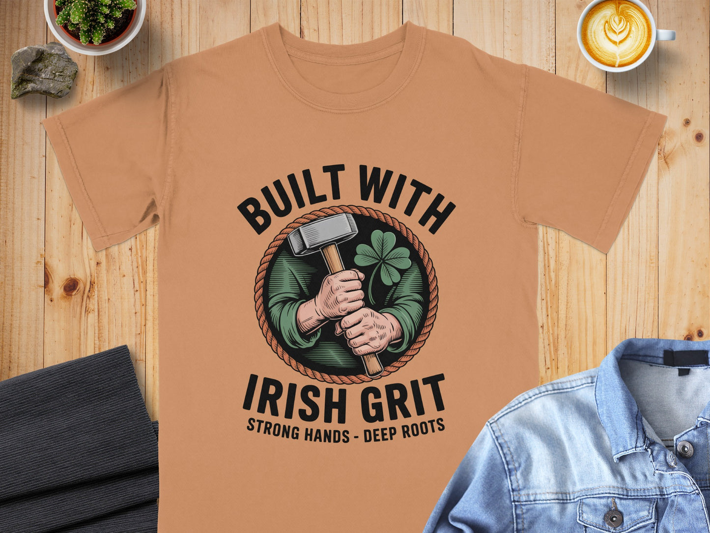 T-shirt with graphic "Built with Irish Grit, Strong Hands - Deep Roots" and hammer.