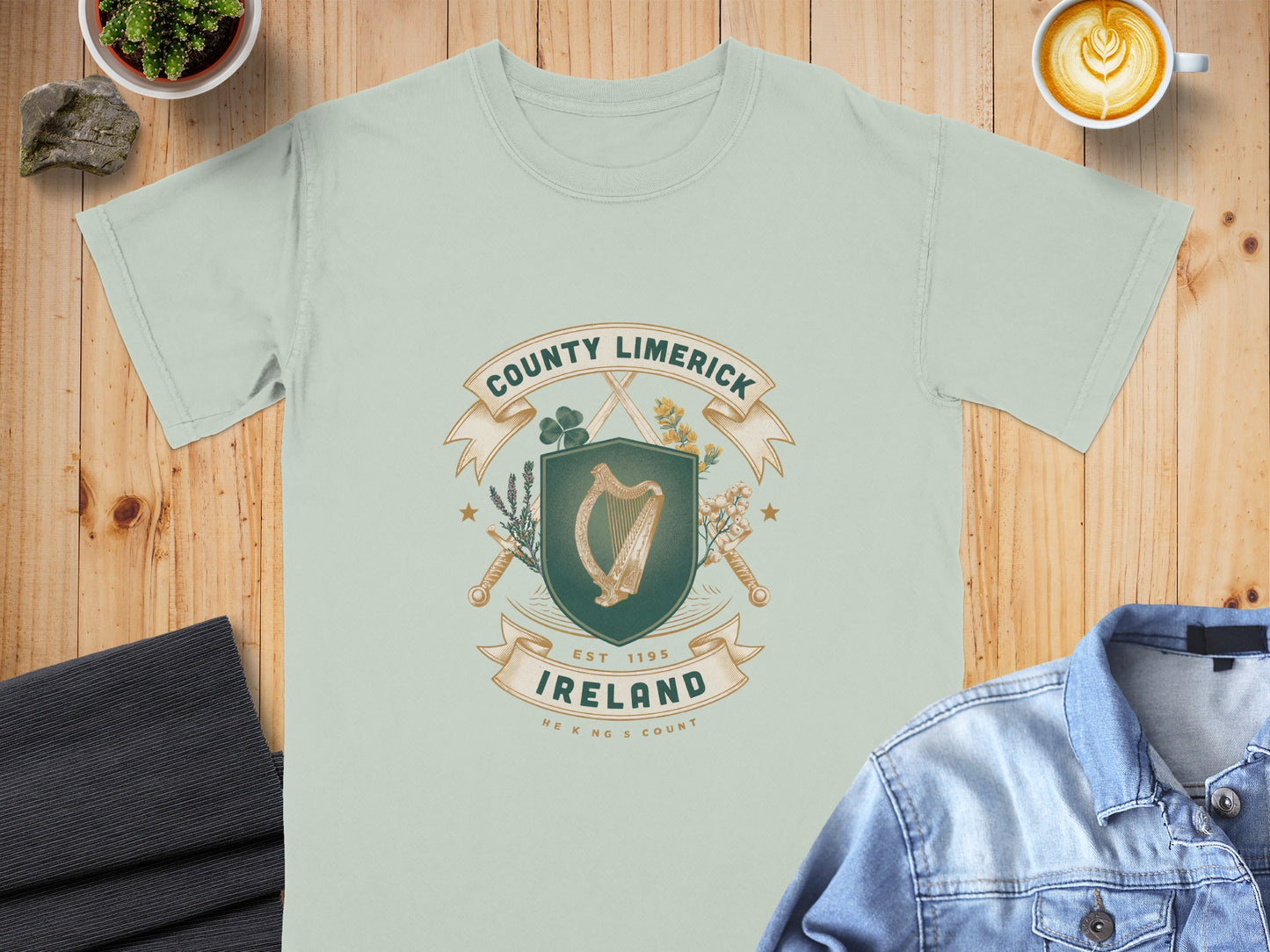 Light green t-shirt with County Limerick, Ireland crest featuring harp and crossed swords.