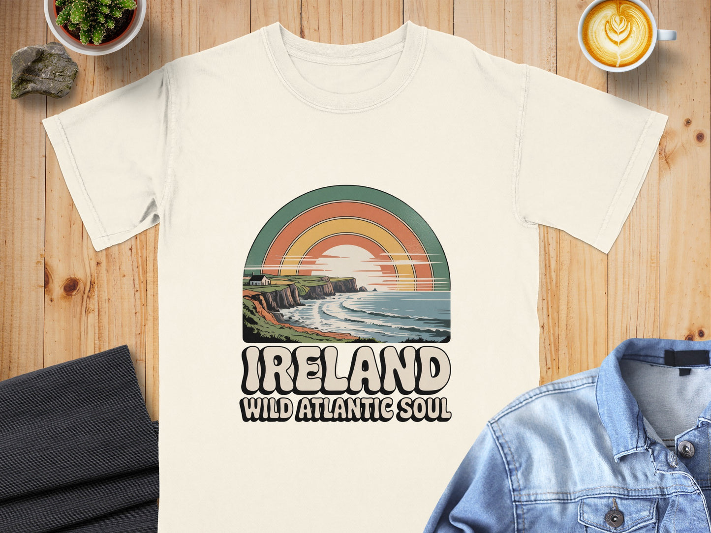 T-shirt with Ireland Wild Atlantic Soul graphic featuring coastal cliffs and rainbow.