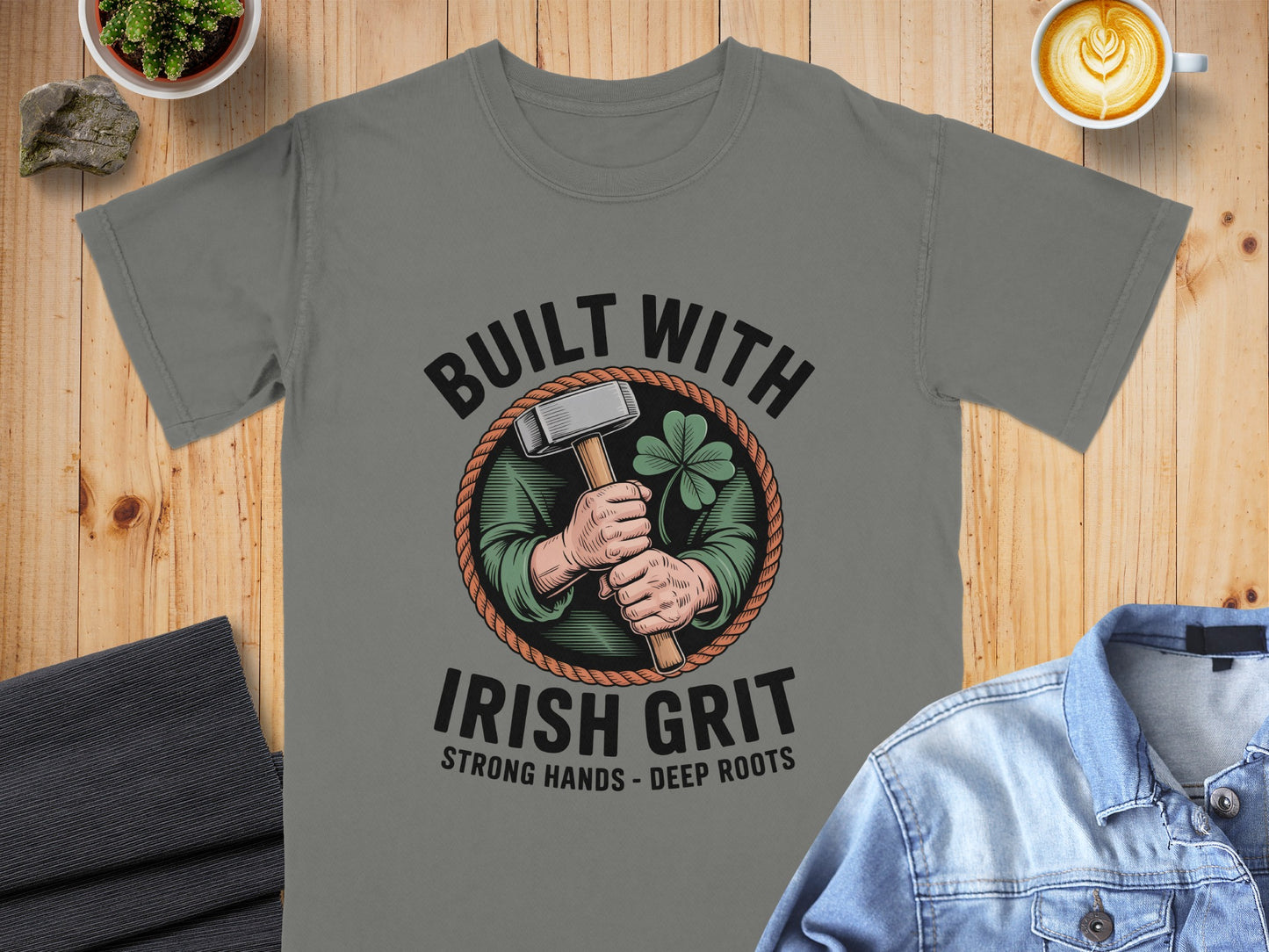 Gray t-shirt with "Built with Irish Grit" text and hammer graphic.
