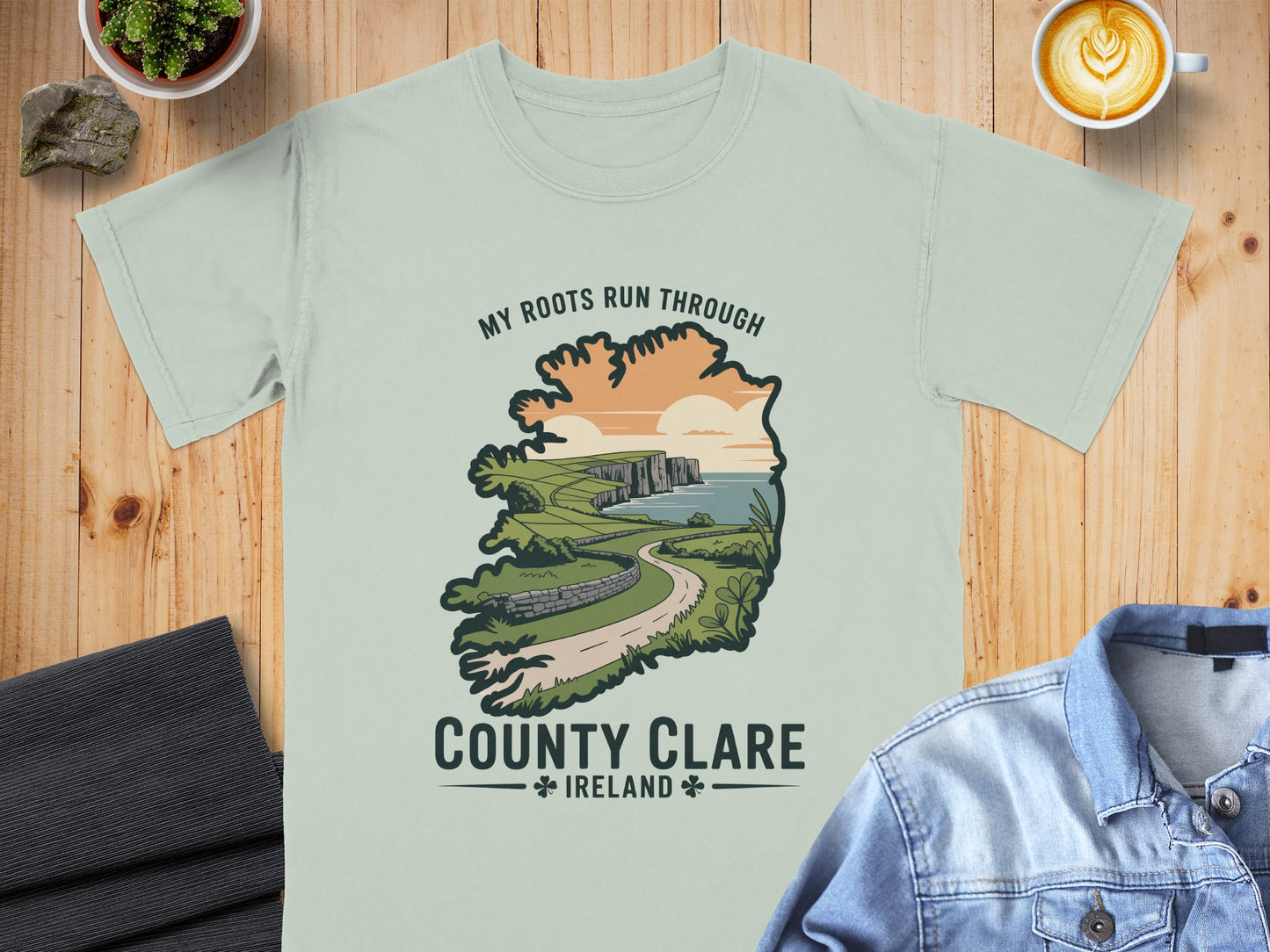 Light green t-shirt featuring "My Roots Run Through County Clare Ireland" graphic.