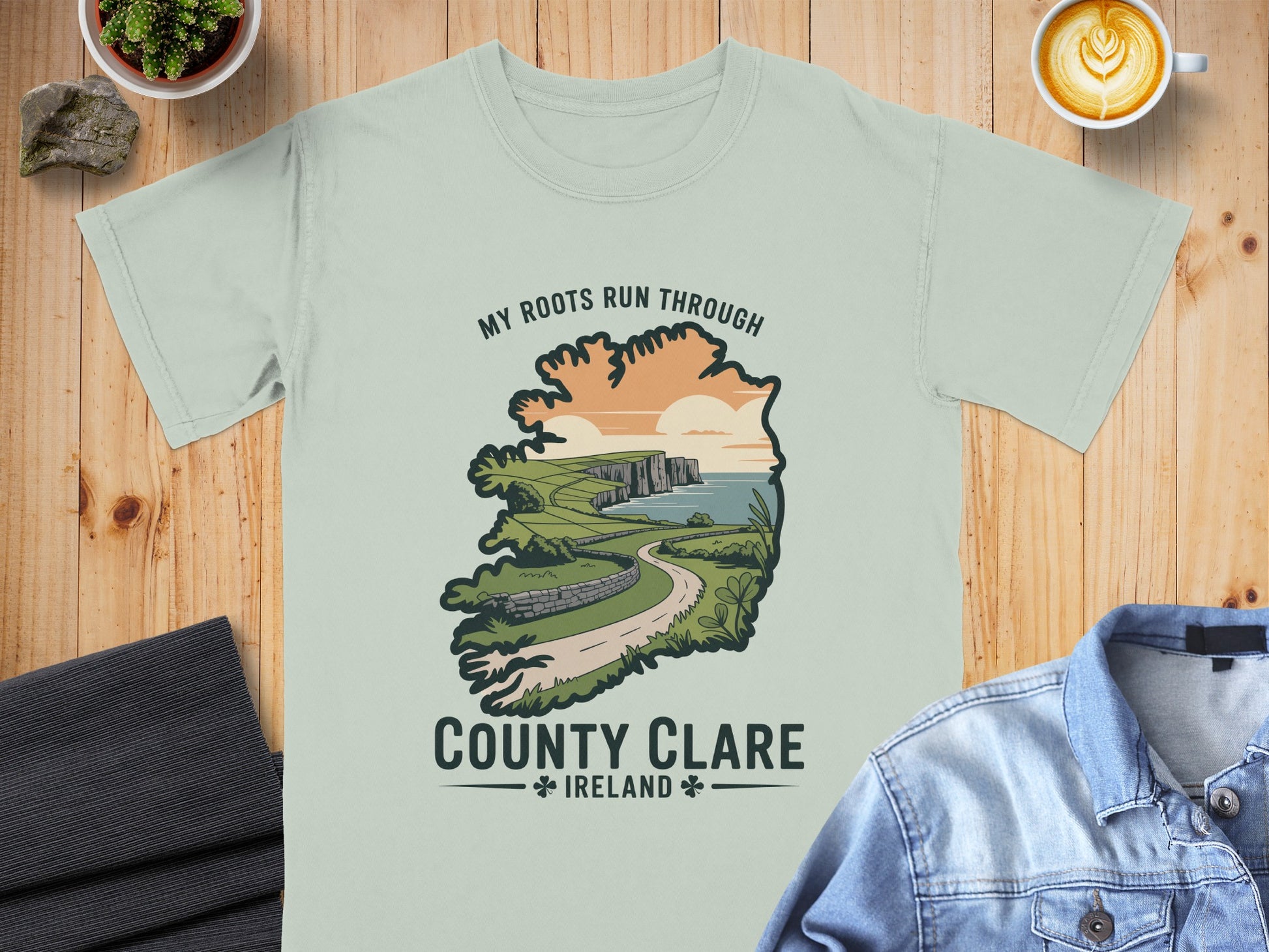 Light green t-shirt featuring "My Roots Run Through County Clare Ireland" graphic.