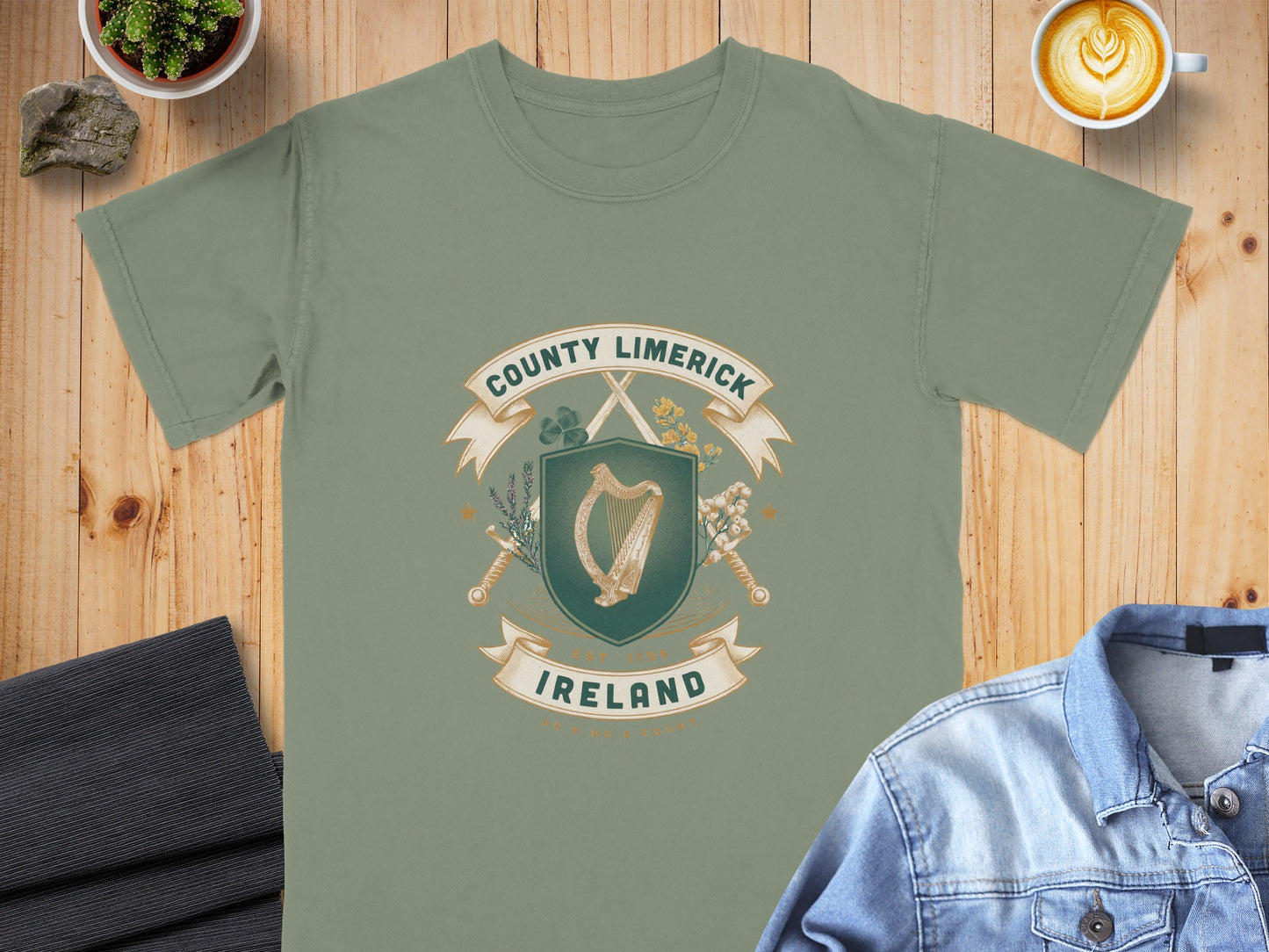 Sage t-shirt with County Limerick Ireland crest, harp, swords, and shamrock design.