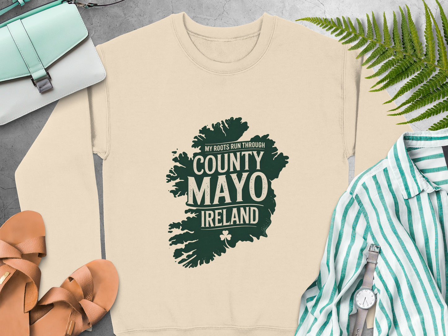 Cream sweatshirt with "County Mayo Ireland" map graphic and clover.