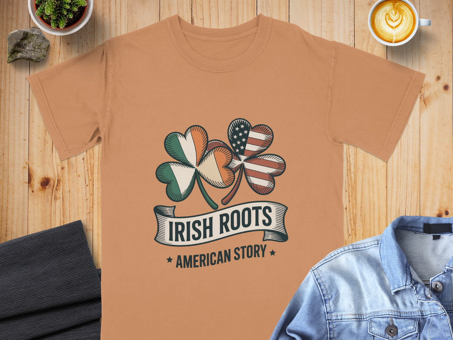 T-shirt with shamrocks representing Irish and American flags, text reads "IRISH ROOTS AMERICAN STORY".