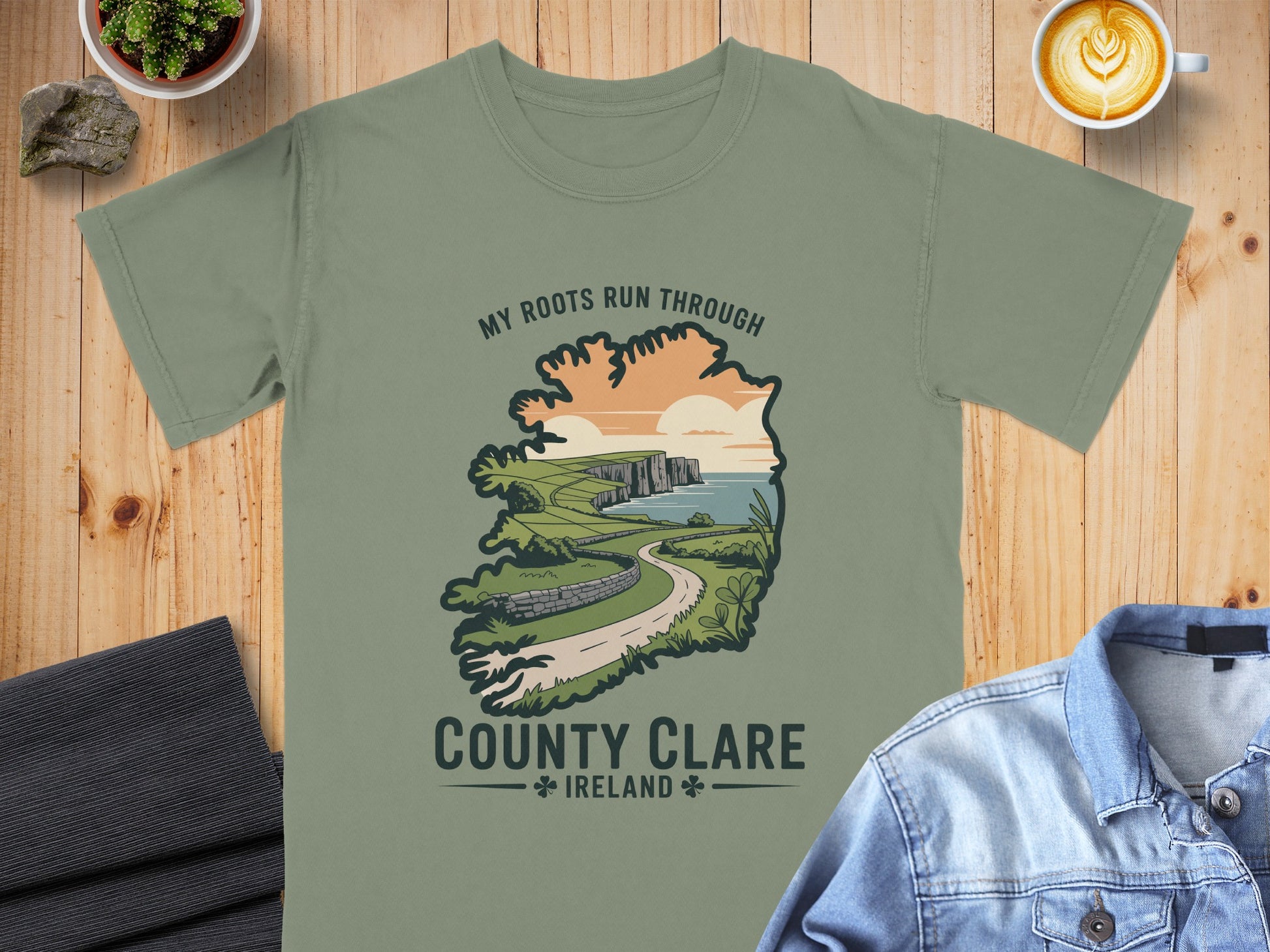 Green t-shirt with "My Roots Run Through County Clare Ireland" graphic.