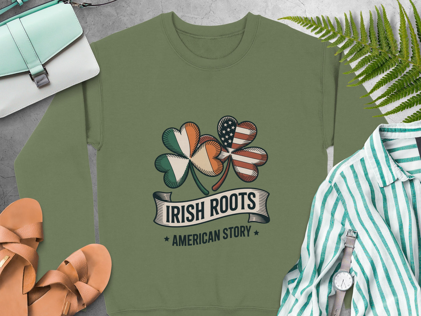 Shamrock graphic: Irish Roots American Story text on Military Green sweatshirt