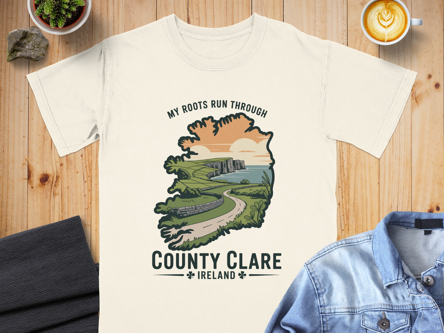 Cream t-shirt with "My Roots Run Through County Clare Ireland" graphic of Irish coast
