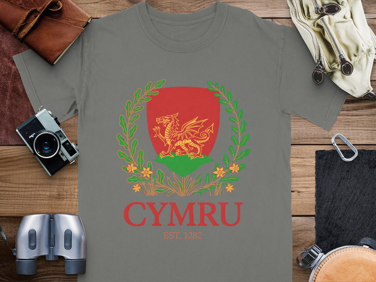 Grey t-shirt with a red and gold Welsh dragon crest and "CYMRU EST. 1282" text.