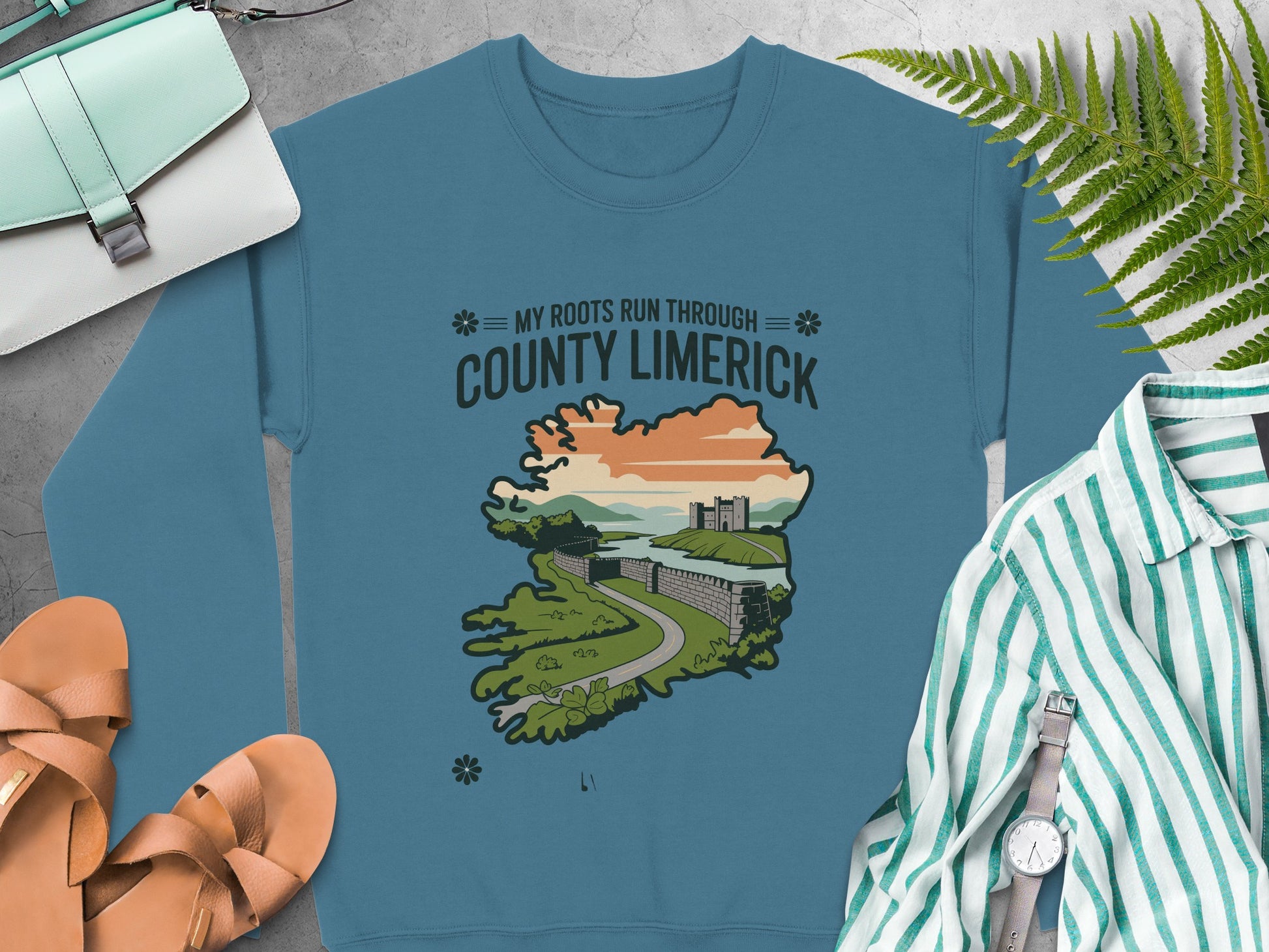 "My Roots Run Through County Limerick" text and scenic illustration on Indigo Blue sweatshirt