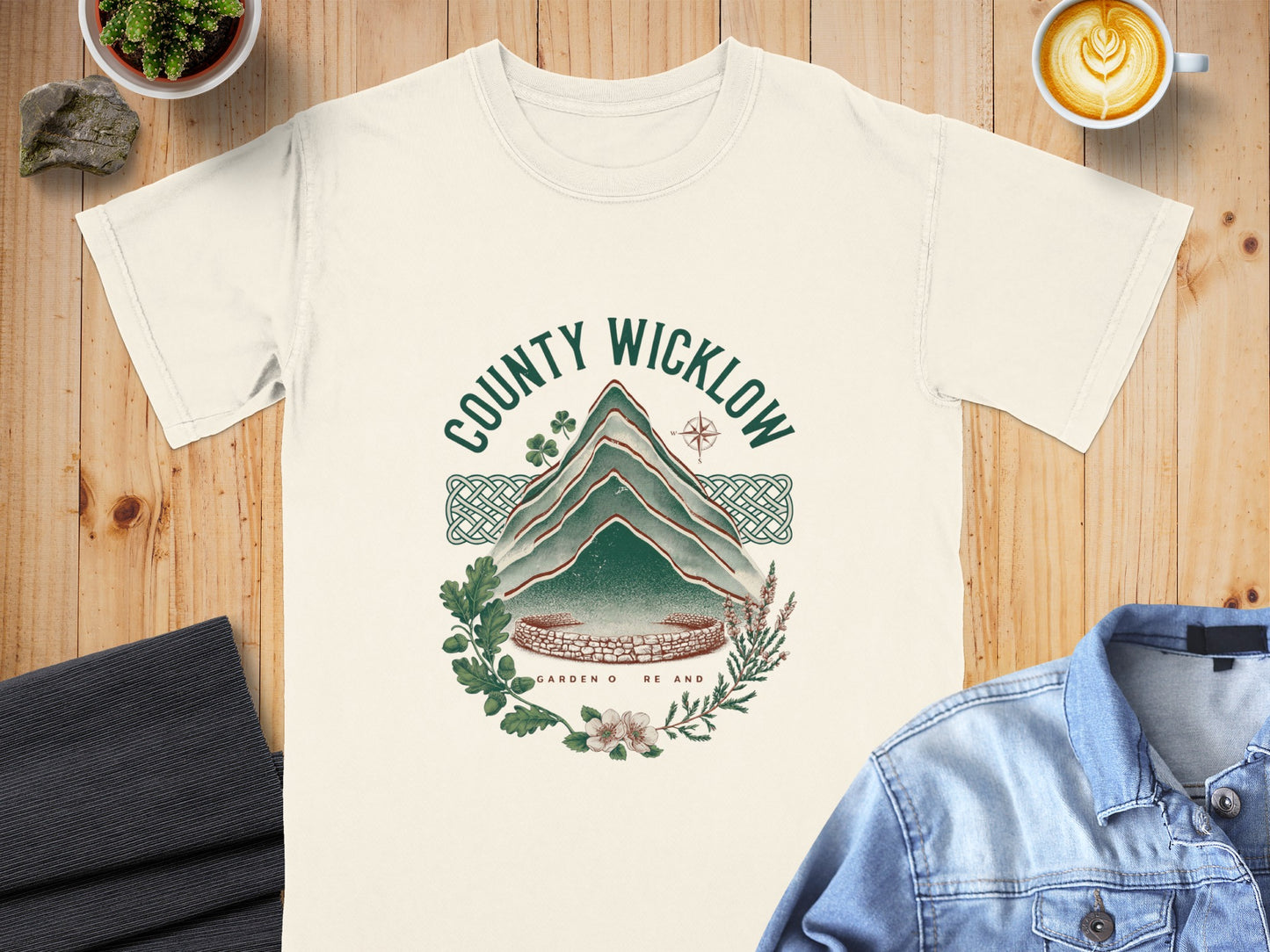 Cream t-shirt with County Wicklow mountain graphic, Celtic knot, and floral wreath.
