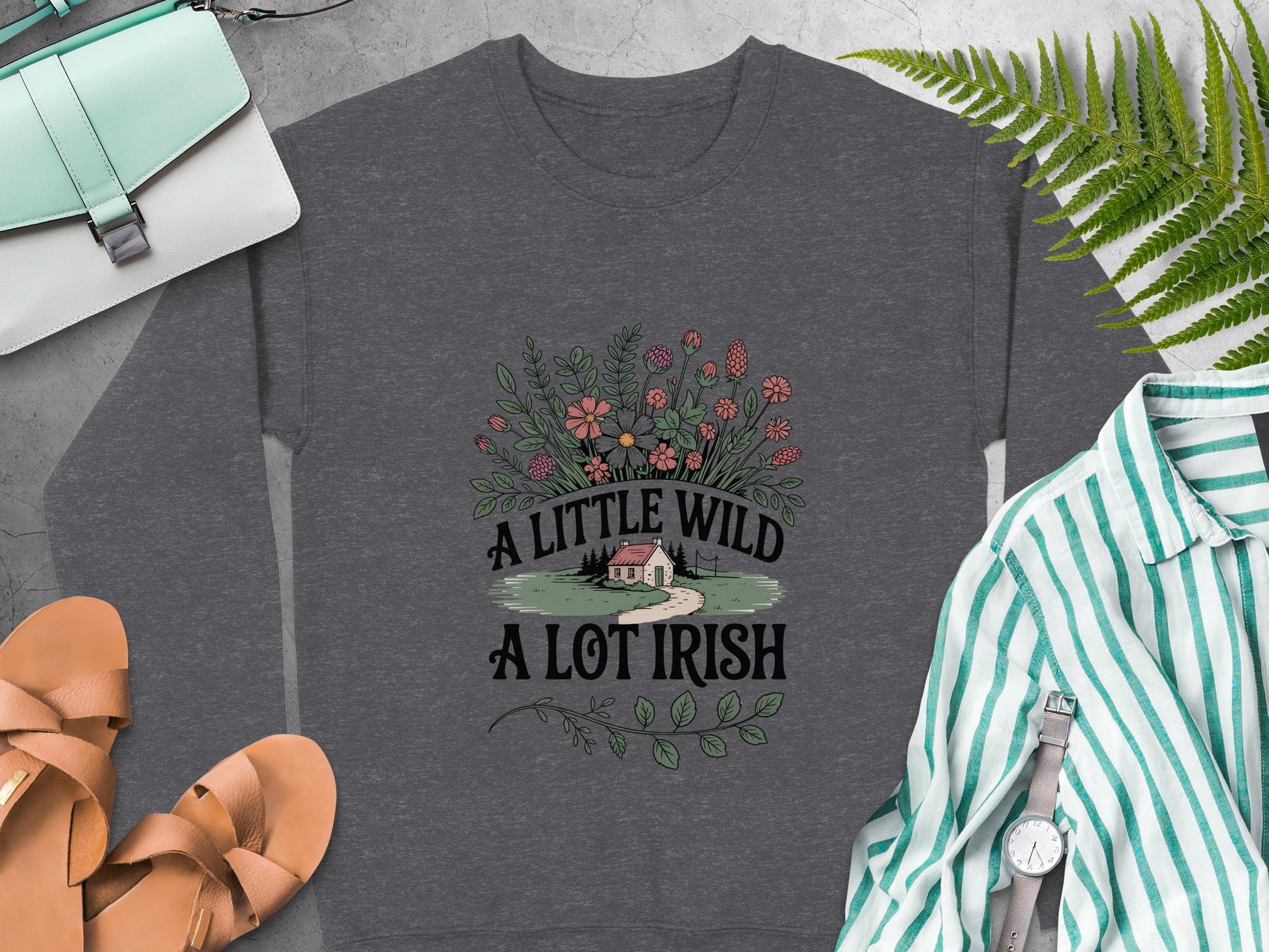 Graphic reading "A LITTLE WILD A LOT IRISH" on Dark Heather sweatshirt