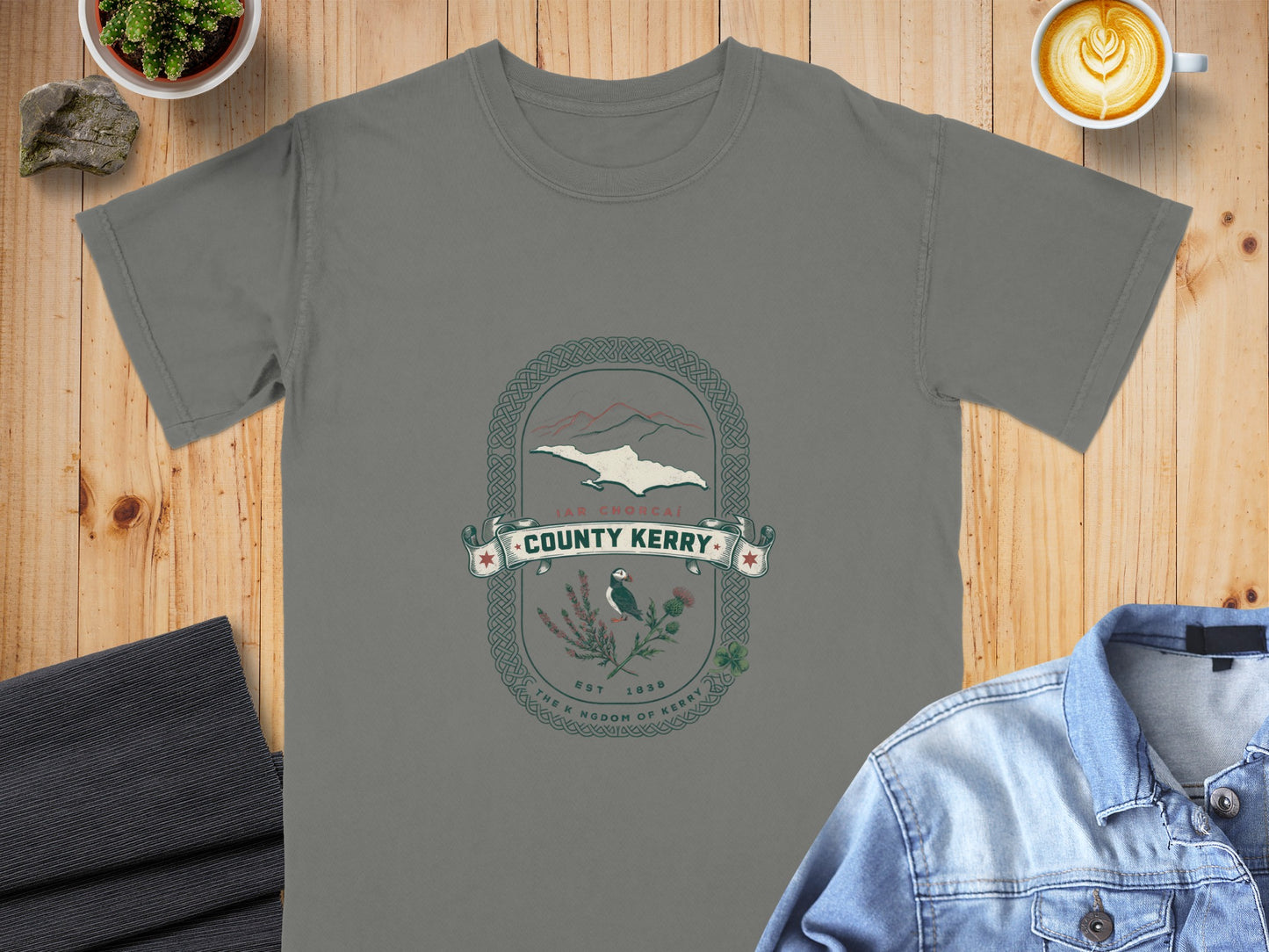 Grey t-shirt with County Kerry crest featuring puffin, thistle, and mountains.