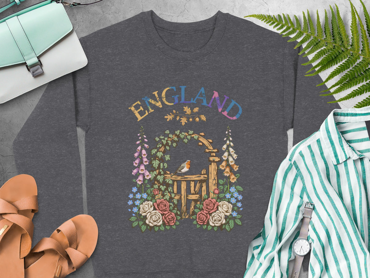 Gray sweatshirt with "England" text and floral garden gate design.