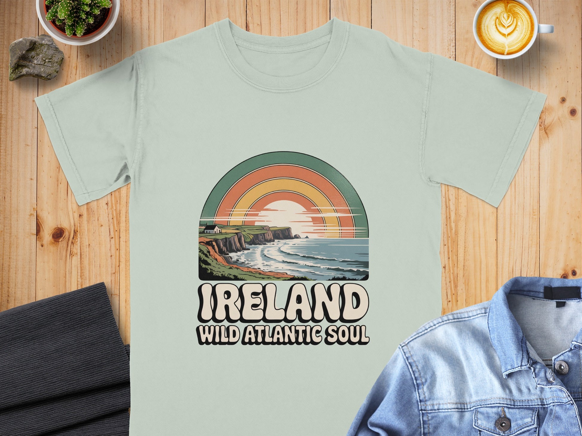 T-shirt with "Ireland Wild Atlantic Soul" and a coastal sunset graphic.