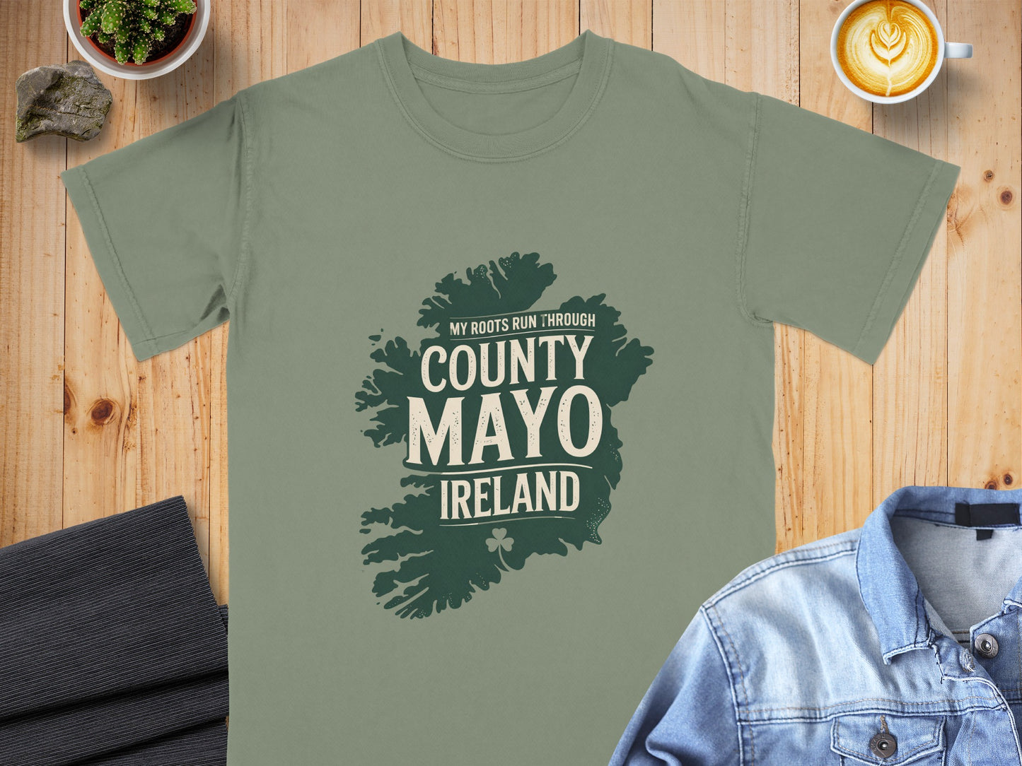Green t-shirt with County Mayo Ireland map graphic and text.