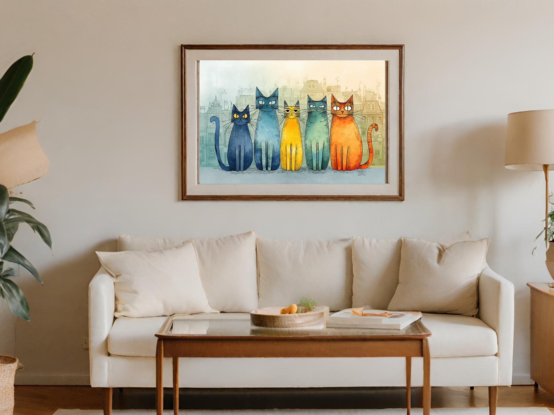 Five colorful cartoon cats sit in a row above a couch.