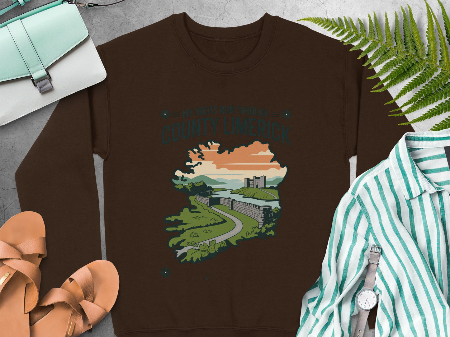 "My Roots Run Through County Limerick" graphic of a castle and river on Dark Chocolate sweatshirt