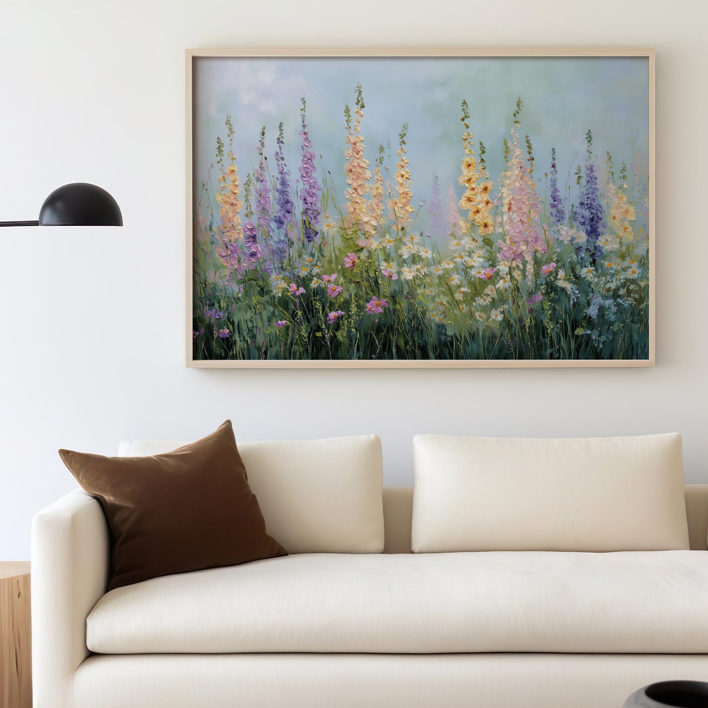 Painting of tall wildflowers in soft yellow, purple, and pink hues.