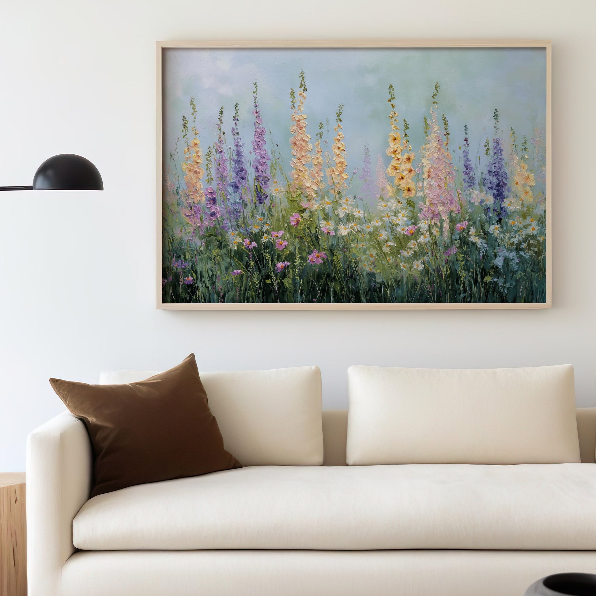 Painting of tall wildflowers in soft yellow, purple, and pink hues.