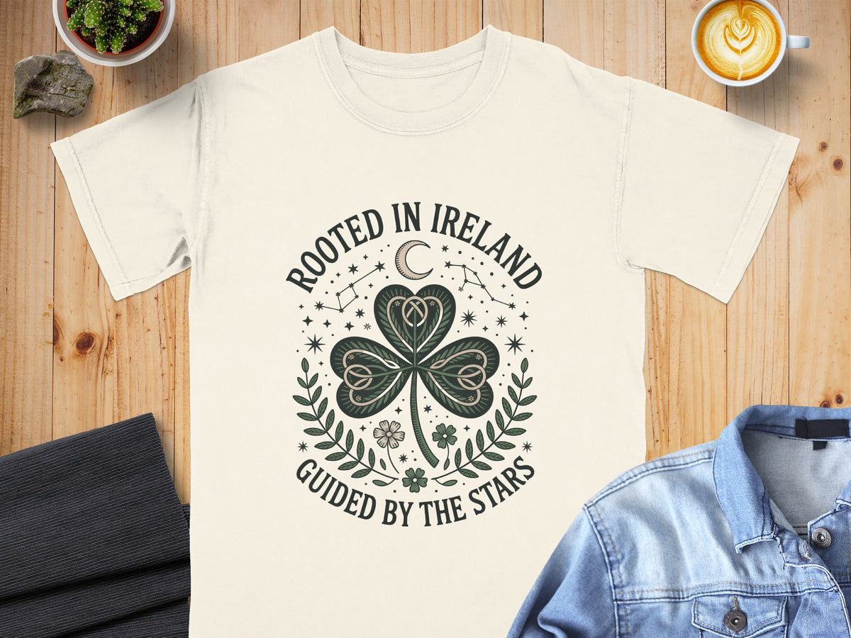 Cream t-shirt with "Rooted in Ireland" and "Guided by the Stars" text around a shamrock.
